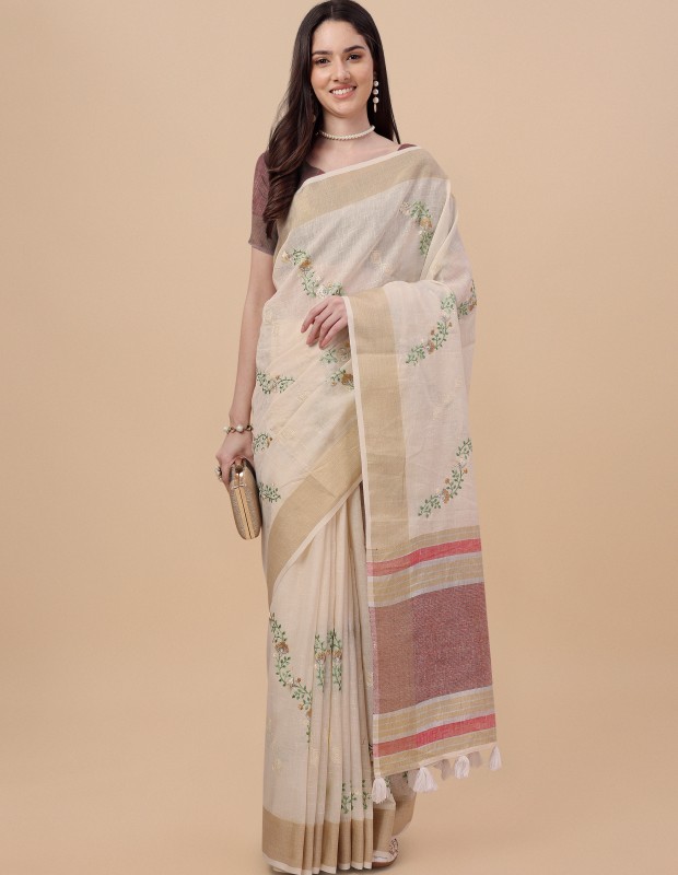 Cream coloured exquisite pure linen embroidered saree