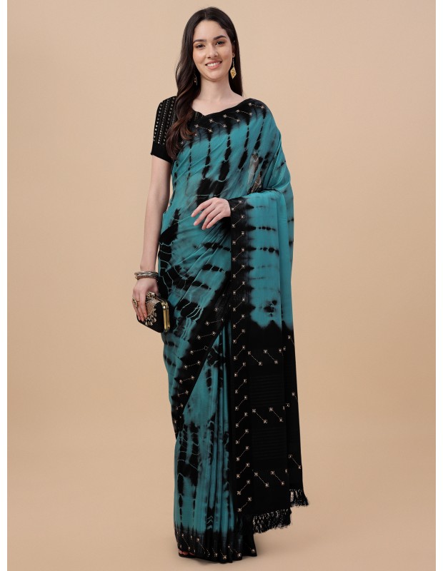 Blue coloured chinnon silk embellished saree with mirror blouse