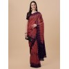 Peach coloured chinnon silk embellished saree with mirror blouse