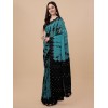 Teal coloured chinnon silk embellished saree with mirror blouse